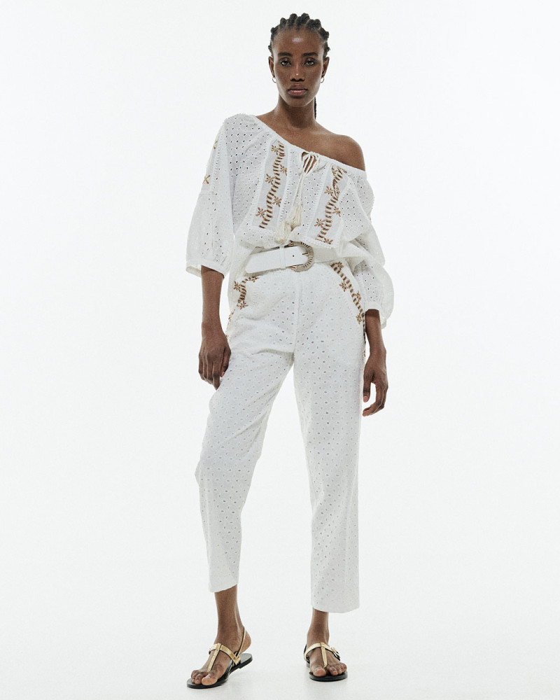 Embroidery blouse with tassels