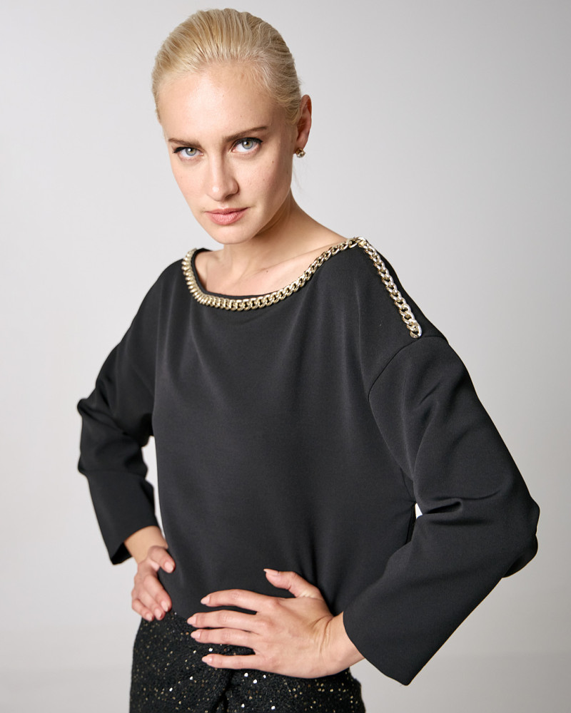 Blouse with chain detailed neckline