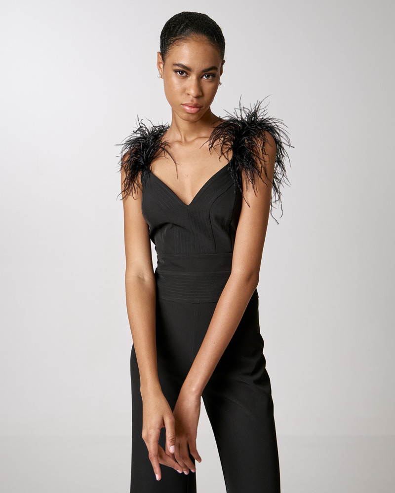 Jumpsuit with feathers