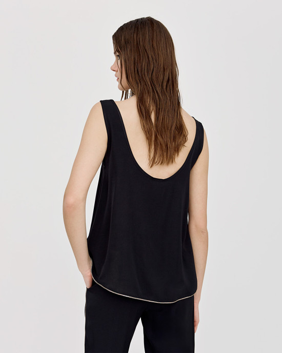 Top with straps and metallic-effect piping details