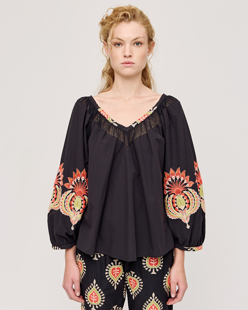 Blouse with fishnet and ethnic embroideries