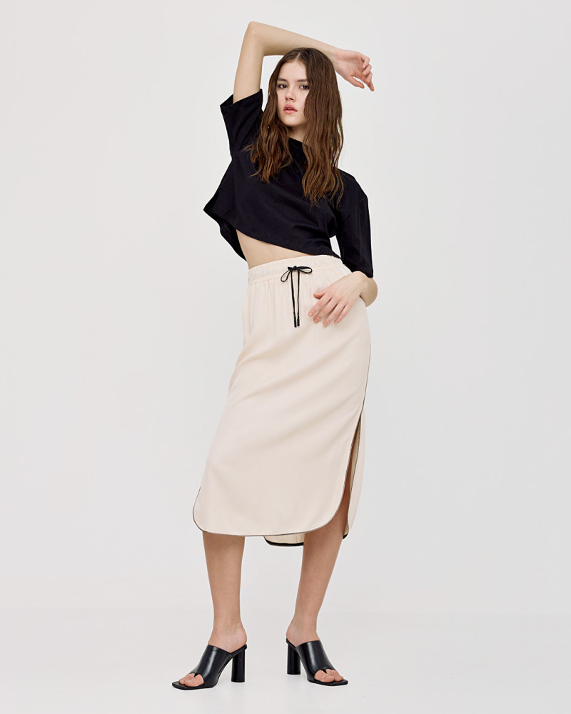 Metallic-effect piping detailed skirt