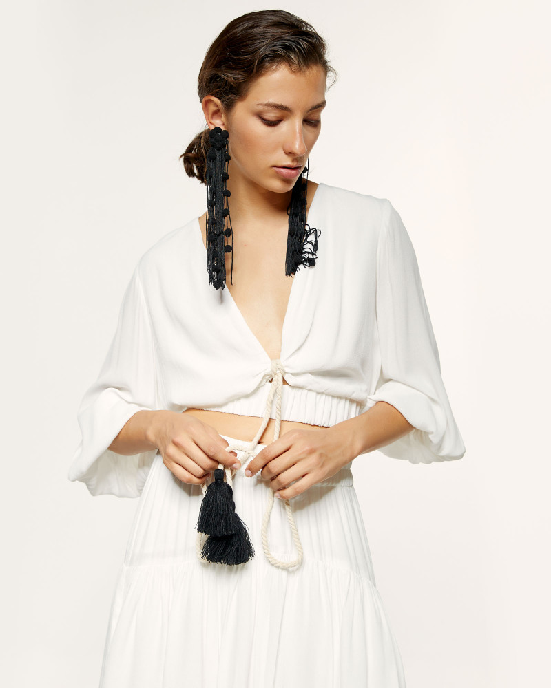 Cropped blouse with tie and tassel
