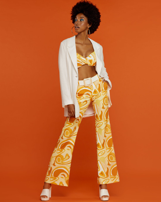 Stretch flared trousers with 70s inspired sky blue kaleidoscope print -  Horizons Lointains