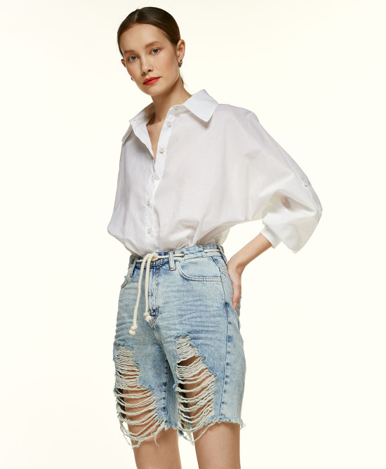 Bermuda jeans with ripped details