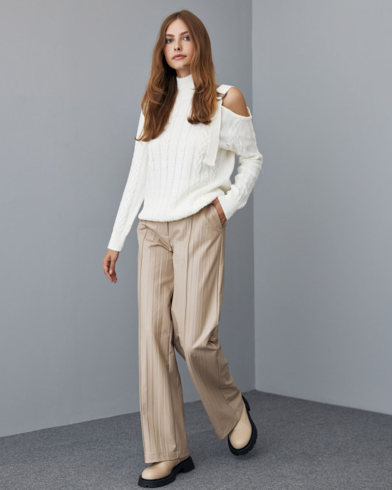 Pants in creased faux leather effect