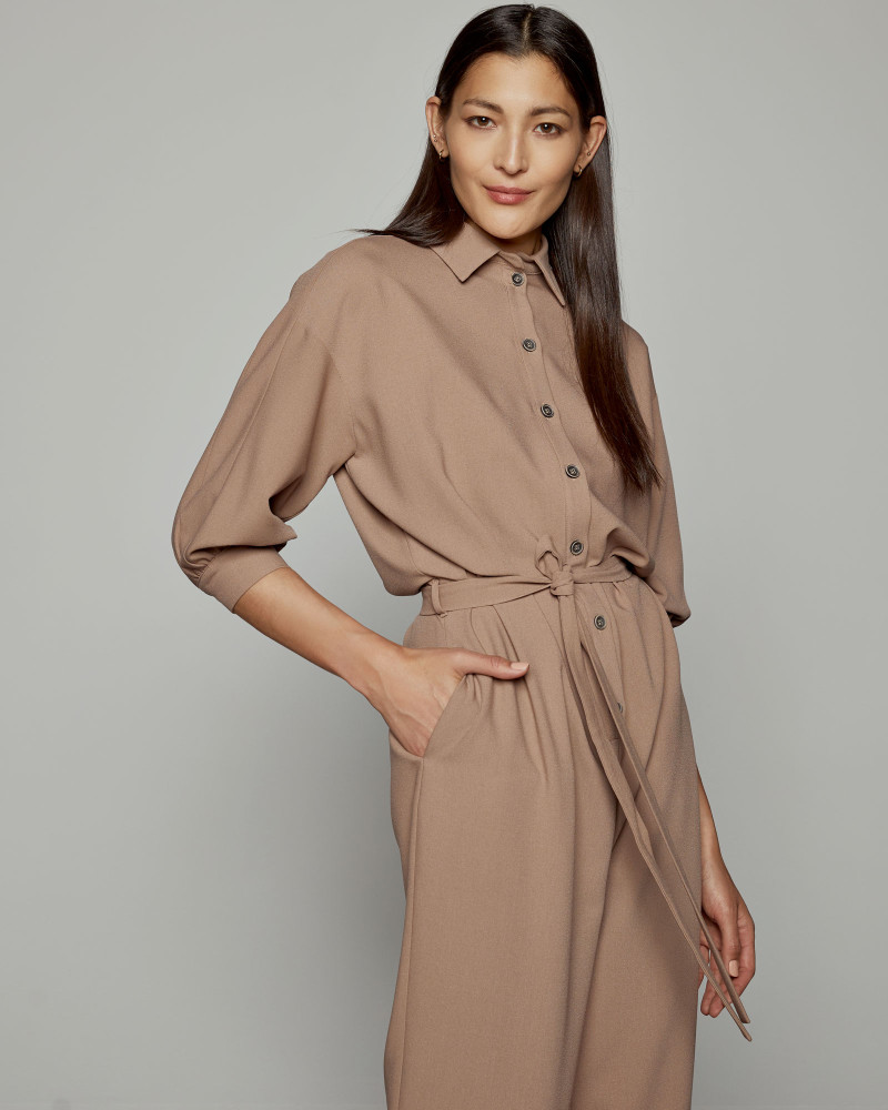 Jumpsuit with buttons and tie belt