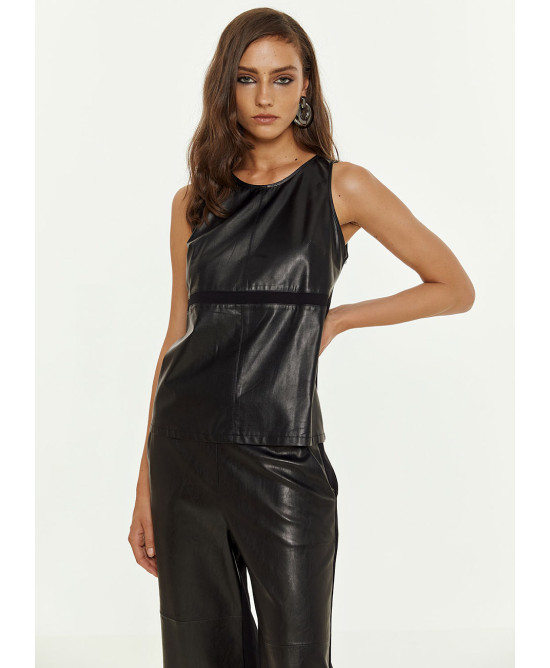 Sleeveless blouse with faux leather