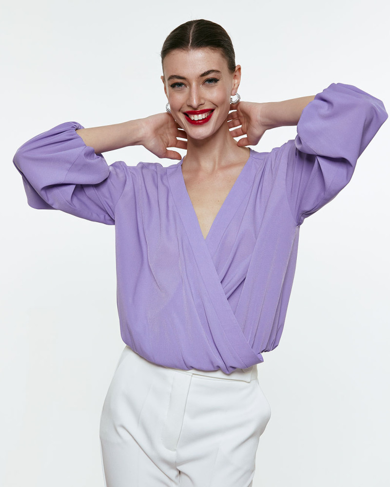 Wrap blouse with puffed sleeves
