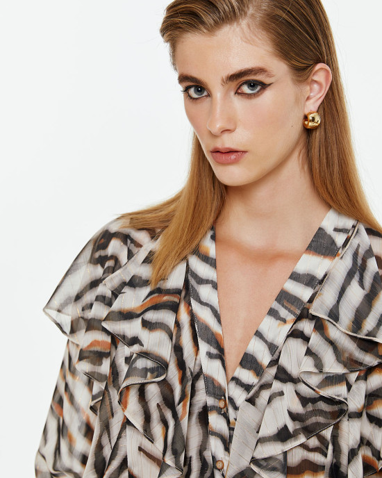 Animal print blouse with ruffles