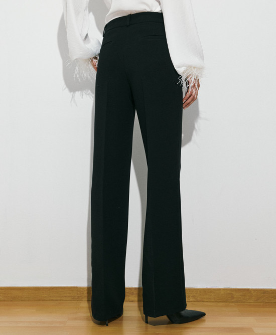 Flared pants with crease seam