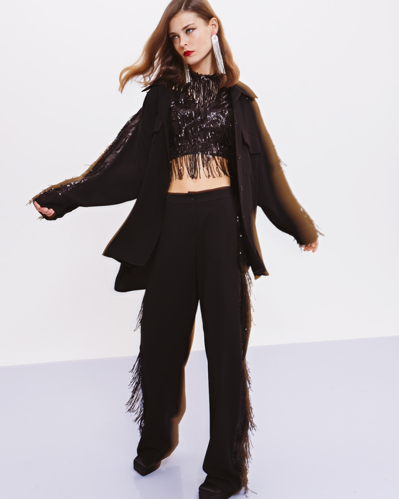 Pants with sequin and fringe trim details